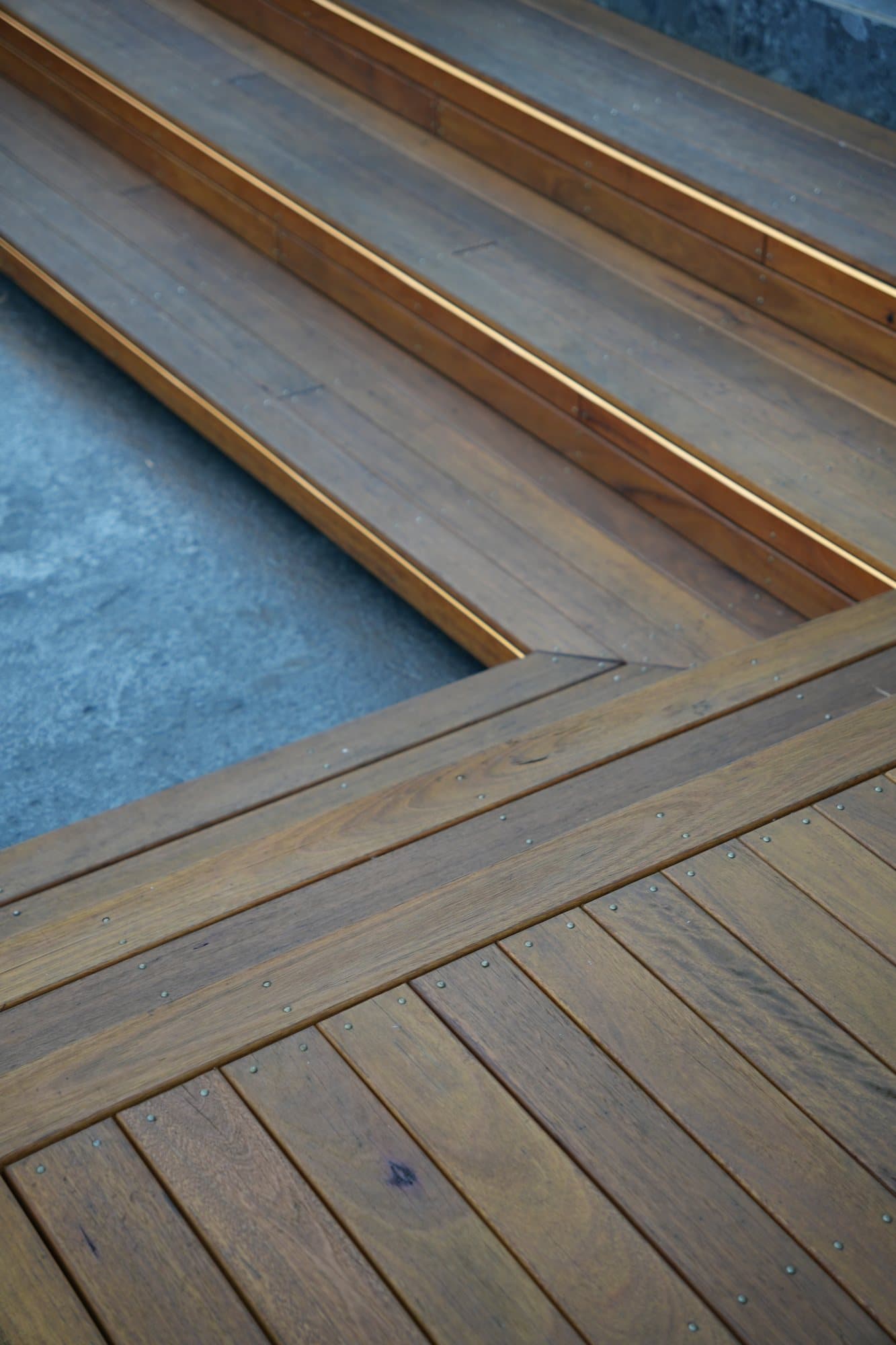 Corner geometry of lit hardwood steps built by JTR Built