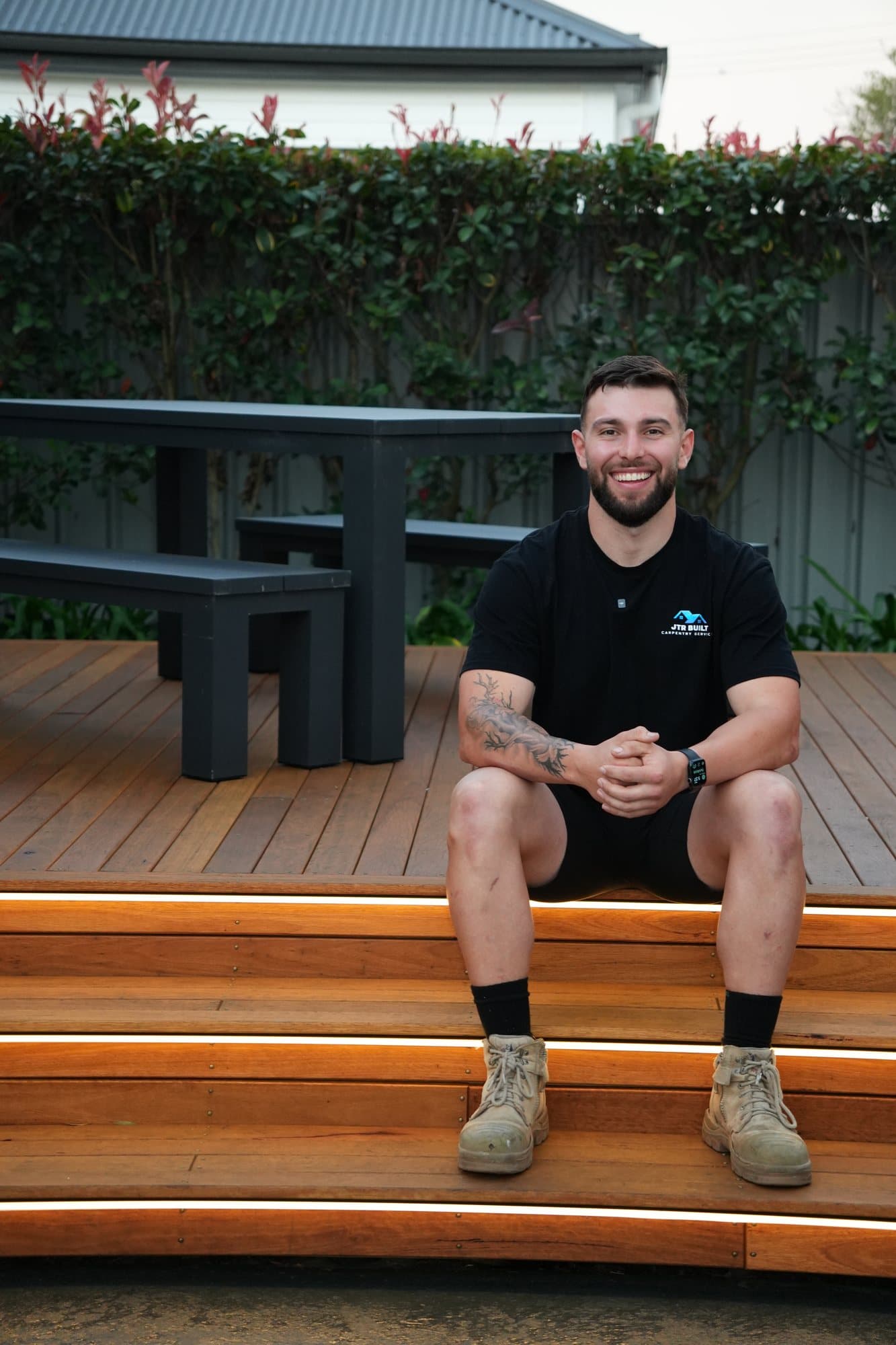 James Russo at the outdoor table on a completed JTR Built deck