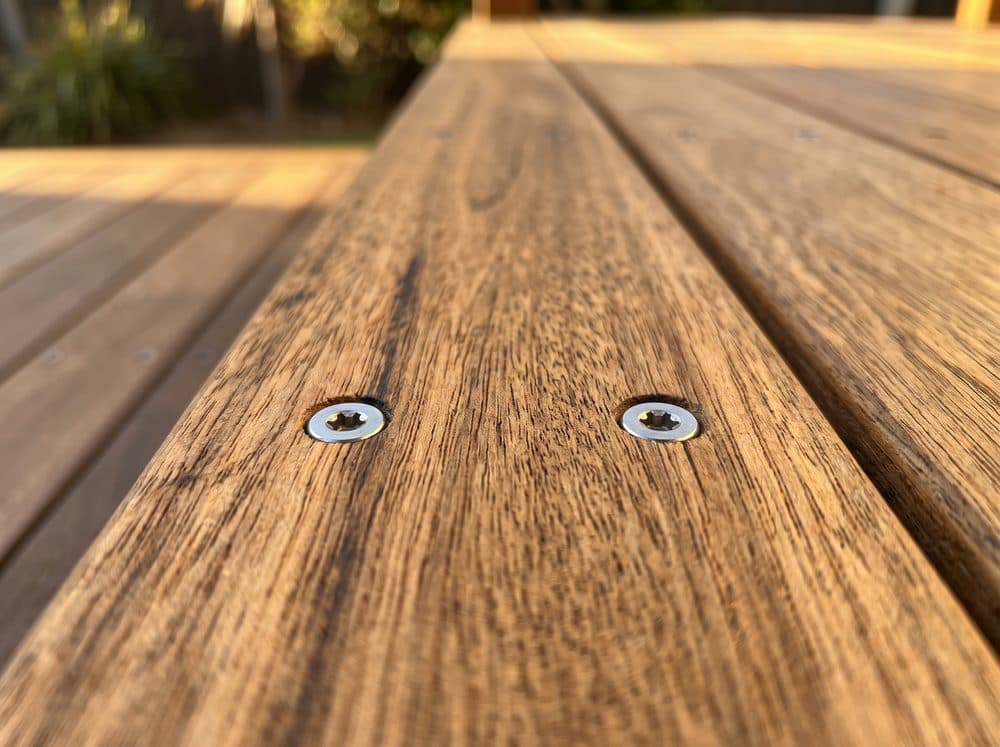 Countersunk stainless decking screws in a neat row